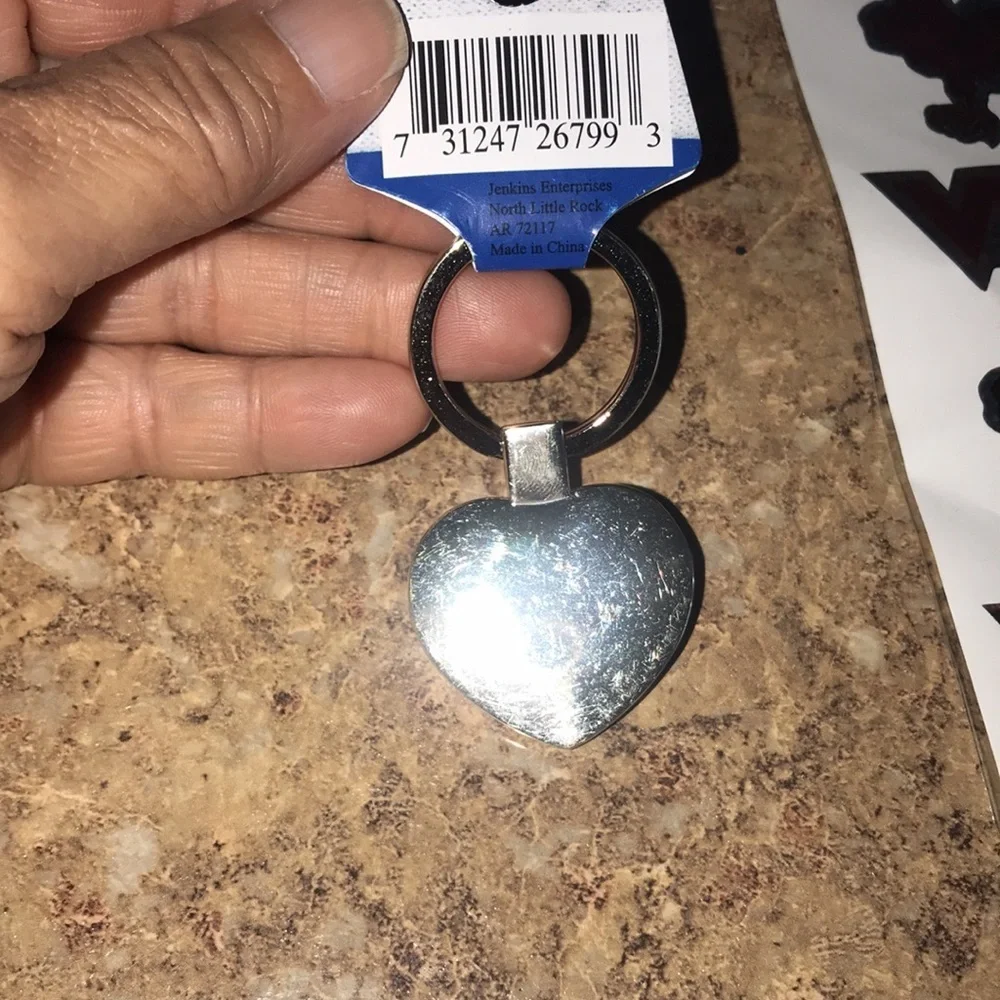 New Women’s VT Keychain + Stickers